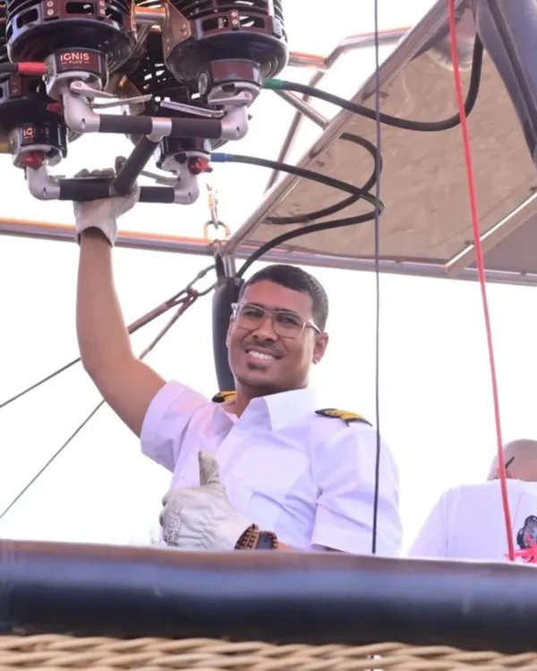 Captain Mo working the burner during a hot air balloon flight over Luxor